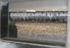 NOVÝ - Vertikální drtič s hydraulicky posuvnou násypkou